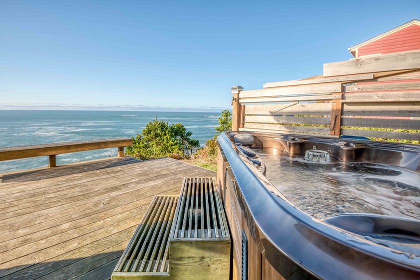 Beach house hot tub with an oceanfront view.
