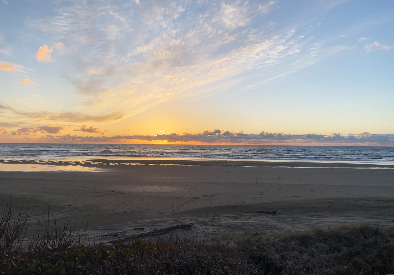 Sunset on the beach, sand, ocean, clouds