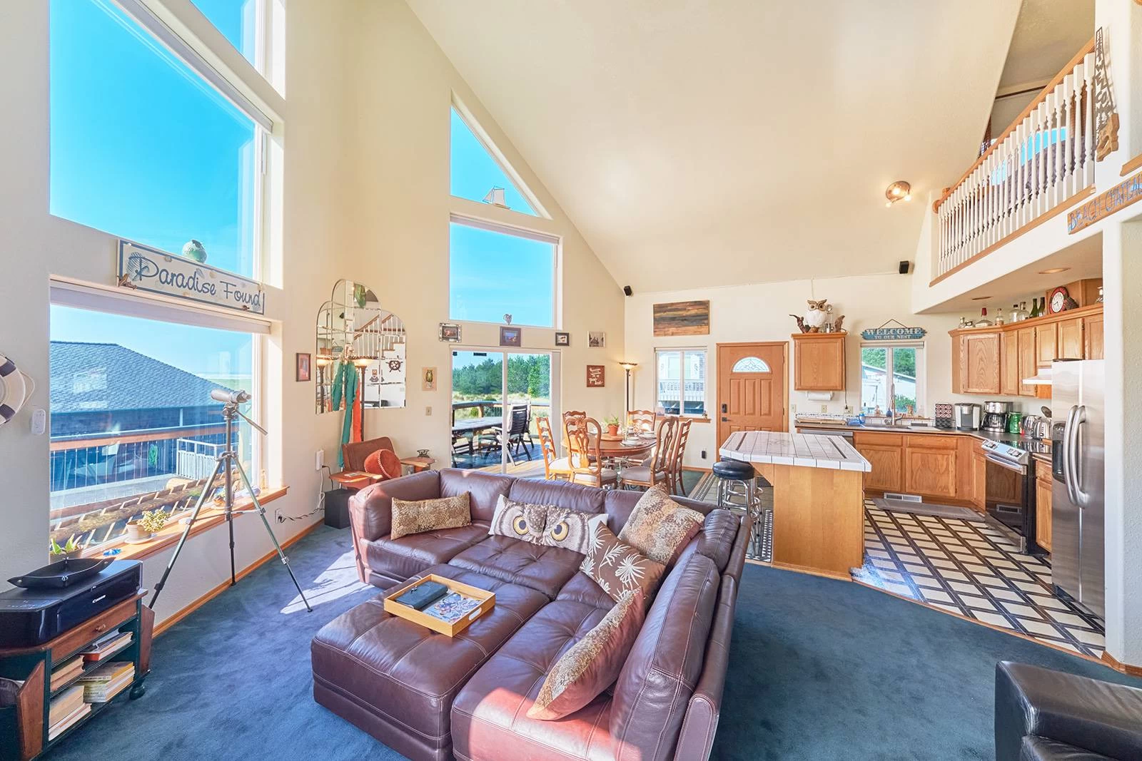 Ocean-view living room with kitchen