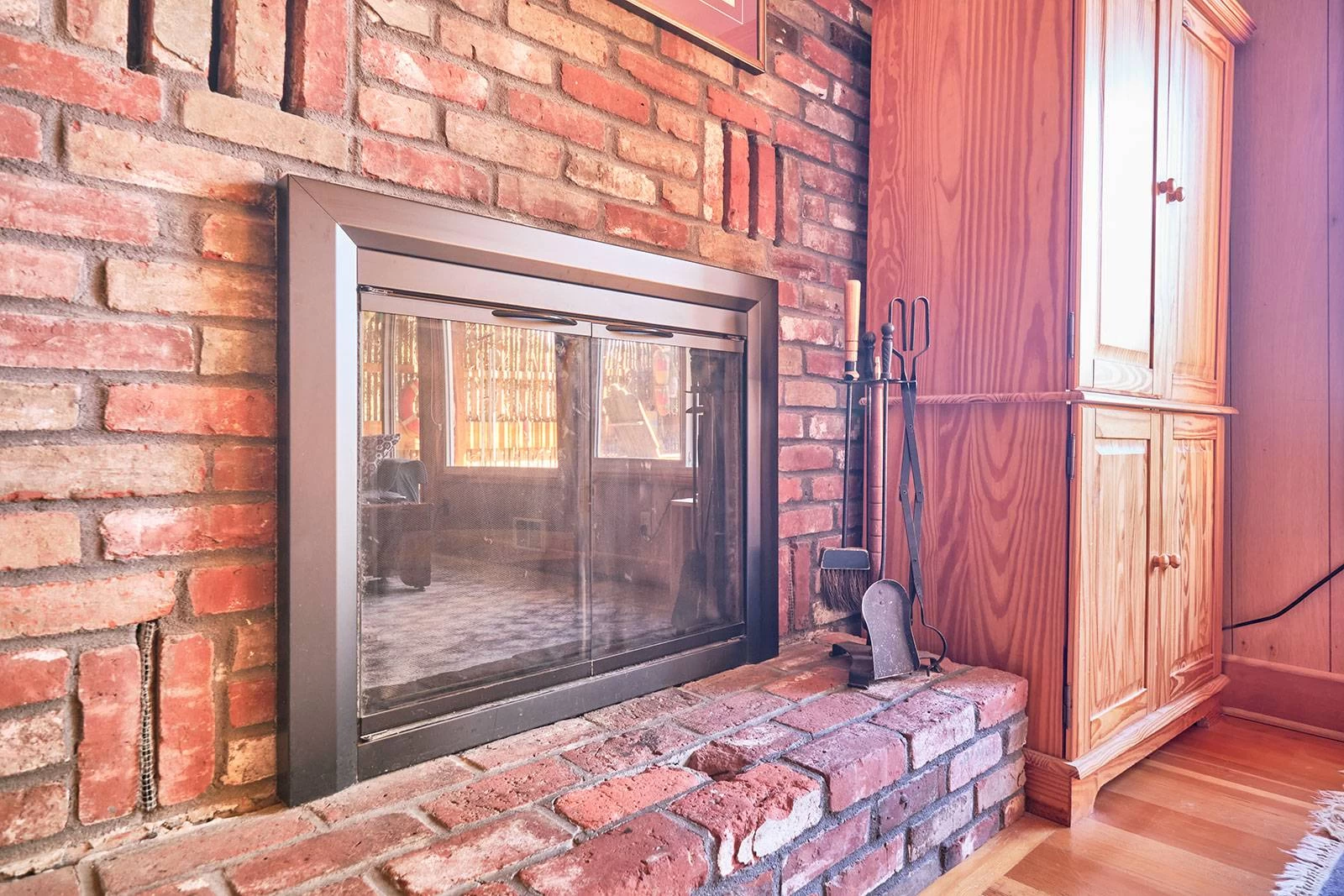 Fireplace with sliding glass doors