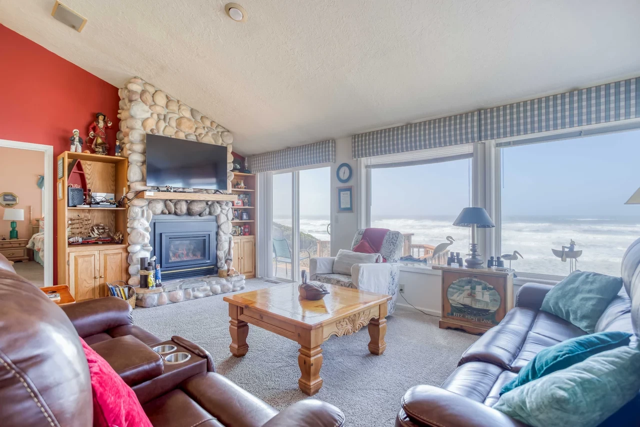 Ocean-view living room with fireplace
